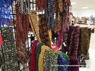 Dorothy Hayes knit these ladder yarn scarves
