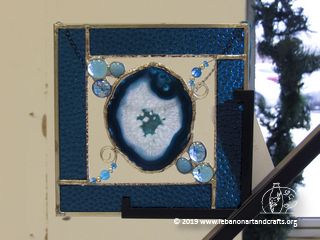 Kathleen Curwen made this stained glass bevel with a blue geode
