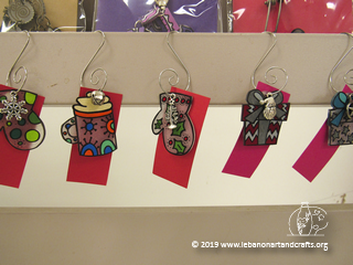 Laura Jean Whitcomb made these shrink art Christmas decorations
