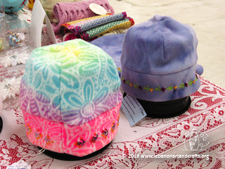 Lorraine Skowronski-Boggis sewed and hand-embroidered these fleece hats