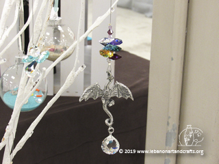 Colette Buisson made this dragon sun catcher