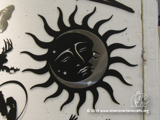 Bart Tuttle fabricated this sun and moon combination