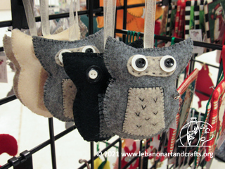 Dorothy Hayes made and hand-embroidered these owl ornaments