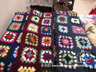 Crocheted granny square lap afghans