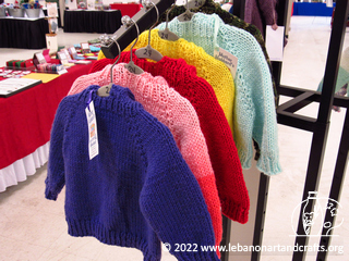 Hand-knit childrens' sweaters