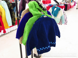 Hand-knit hooded sweaters for children 