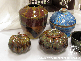 Shannon LaGrow made these ceramic pots and decorative pumpkins
