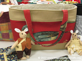 Diana Wyman constructed this purse and  Woodlander character