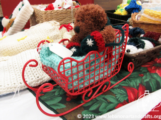 Teddy bear in a sleigh