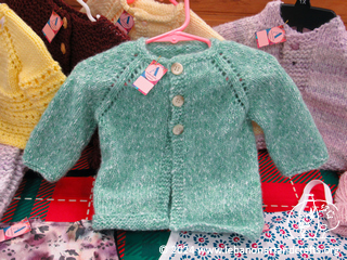 Hand-knit baby sweaters