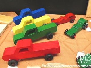 Wooden toy cars and trucks